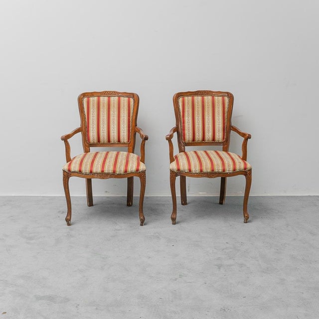 Pair of armchairs. Wooden frame and fabric upholstery. Item in good condition with minor signs of wear. See photos.