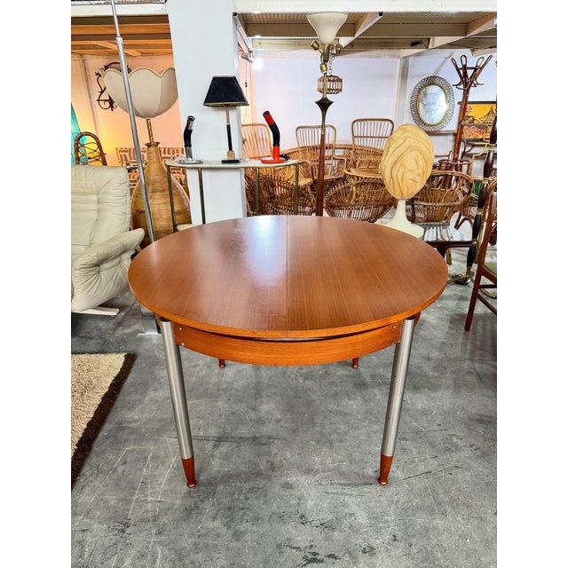 Brown Extendable Round Table with Teak Top and Feet and Satin-Finish Metal Legs, 1960s For Sale - Image 8 of 8