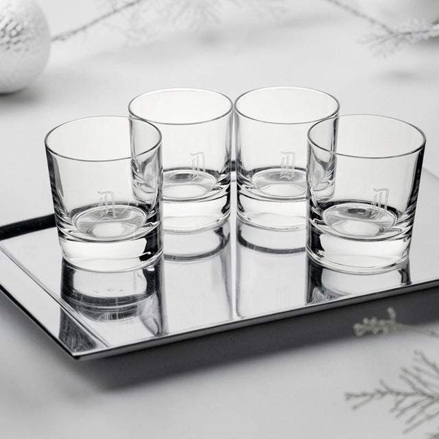 A set of four Nachtmann Bleikristall double old fashioned whiskey tumblers, crafted in Bavaria, Germany, during the late...