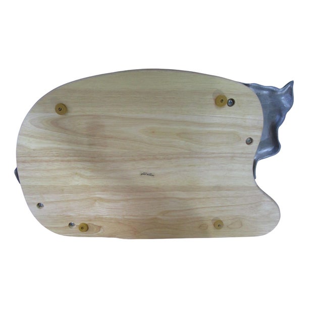This durable bull-shaped cutting board combines beechwood and cast aluminum for a stylish and functional kitchen...