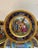 An elaborate set of 12 Royal Vienna porcelain hand painted cabinet plates with cobalt and gold borders. The plates measure...