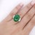 10.91 carat oval cabochon cut natural jadeite jade and baguette diamond side side stone ring in platinum 900 filigree...