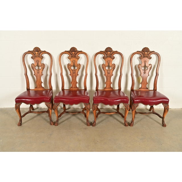 An outstanding set of four antique Georgian, Chippendale, or Queen Anne style dining chairs By Berkey & Gay USA, Circa...