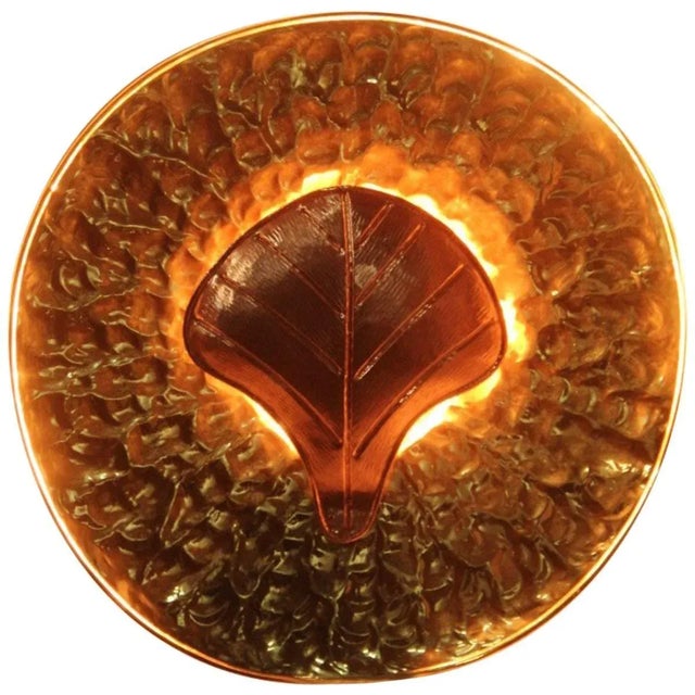 These are special and rare sconces made of brass and copper from circa 1970. Their light mimics the solar eclipse. Up to...