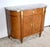 Elegant Louis XVI style buffet, topped with a magnificent bize breach marble from Hautes-Pyrénées, and sporting a throat....