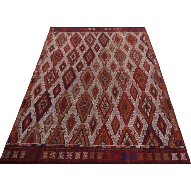 Handwoven in fine quality wool, a 5x7 kilim rug from Turkey circa 1950-1960 joining our Kilim & Flatweave collection. The...