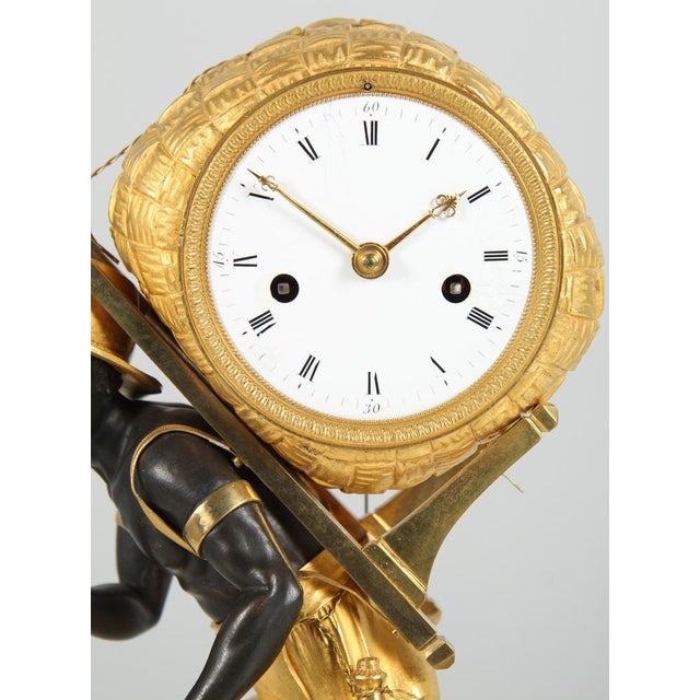 Pendule portefaix paris bronze, enamel empire around 1810 dimensions: h x w x d: 36 x 28 x 11 cm : beautiful, fire-gilded...