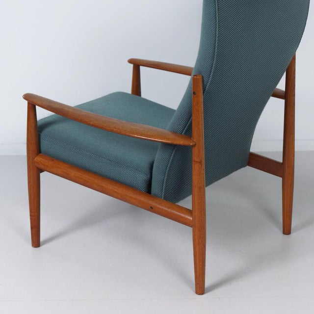 Grete jalk france & søn armchair from the 1960s, a rare high-back version with an elegant teak frame and green upholstery....