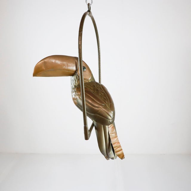 We offer this toucan sculpture by Mexican artist Sergio Bustamante, circa 1960 made in brass and copper with fantastic...