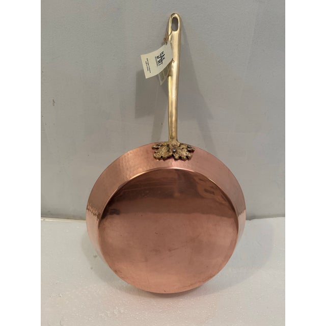 Beautiful never used 11” hammered copper fry pan with solid brass handle and hand plated tin lining. Made in Turkey in by...