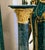 This elegant French Rococo style pedestal features a beautiful marbleized green finish that adds depth and sophistication...