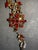 1950s MCM Jewelry by Bohemian (Czech) Artisans. Panel Link Bracelet Large Faceted Oval Ruby Glass Stone, Surrounded by Quatrefoil-Arranged Floral Clusters. For Sale - Image 5 of 8