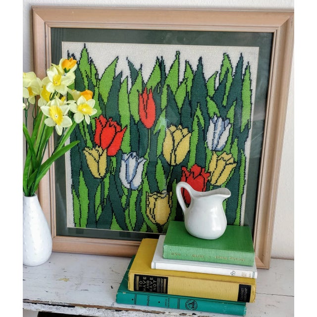 This vintage needlepoint artwork embodies the essence of spring and summer with its bright and fun design! The vivid...