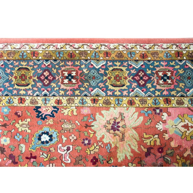 A wonderful early 20th century German Tetex rug woven with a densely woven large-scale floral patterned field surrounded...