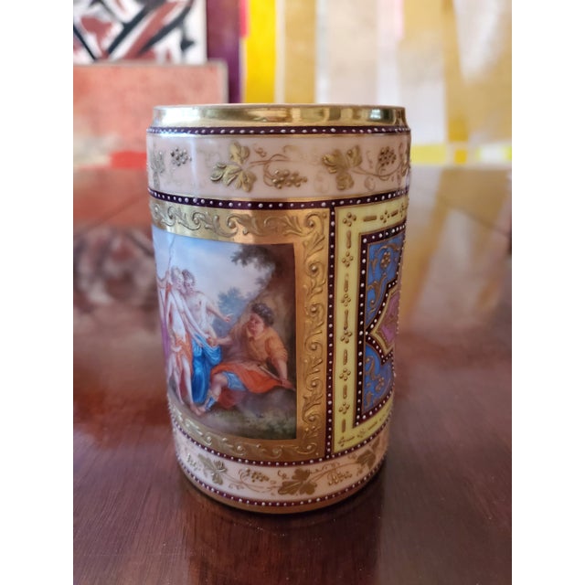 An absolute museum quality rich raised gold and enamel royal vienna mug. All hand painted and artist applied with an...