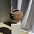 Large gray and red terracotta pot with rattan handles and crossbars. Weight: 4.2 kg, Height: 42 cm; Diameter: 34 cm; Neck...