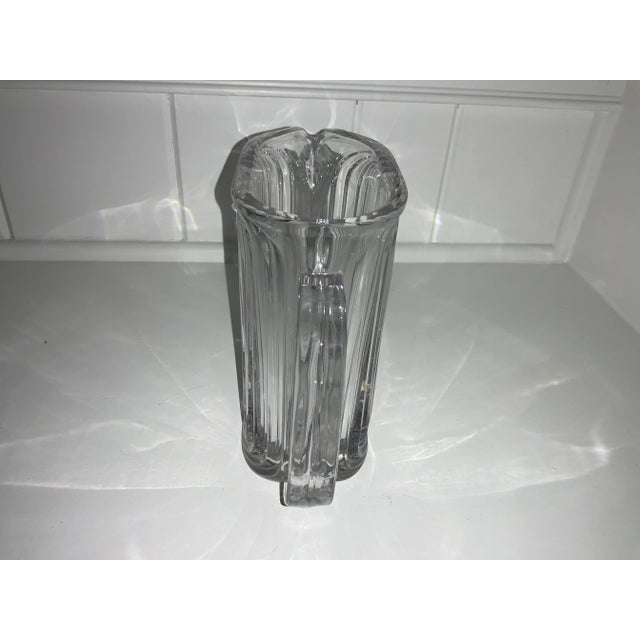 Gorgeous Clean lined contemporary pitcher. Great for the bar- nice size for scotch and water.