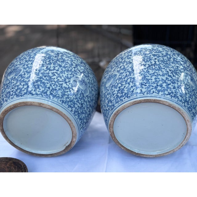 Asian Pair of Ginger Jars Exhibit Classic Blue & White Chinoiserie Patterns: Highly Sought After Collectible :Qing Dynasty Characteristics For Sale - Image 3 of 6
