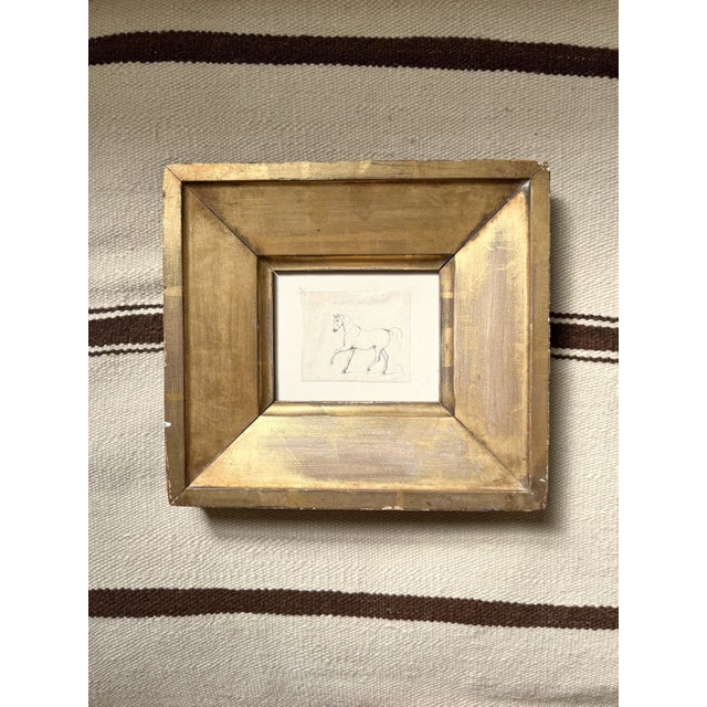 17th c Chinese drawing depicting a horse, ink on paper. Framed in an antique gilt wood frame, d rings at back, preserved...