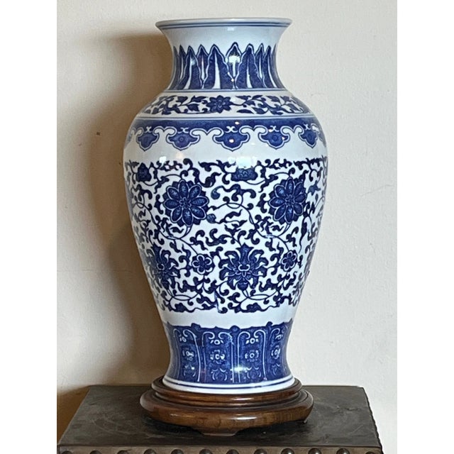 Elevate your home decor with this elegant 12-inch Chinese blue and white porcelain vase. Featuring a classic baluster...