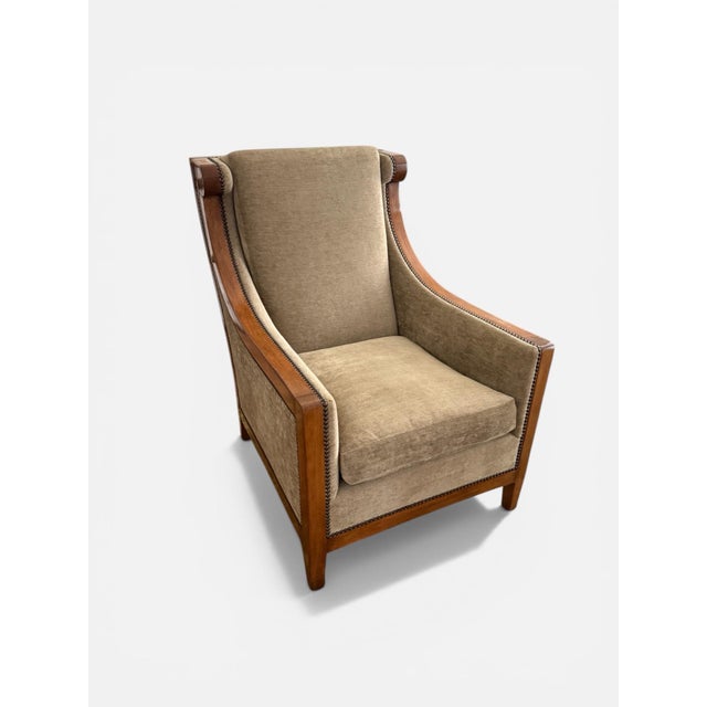 The London Club Chair from luxury furniture maker Dessin Fournir. Handmade in Los Angeles, a beautiful walnut frame...