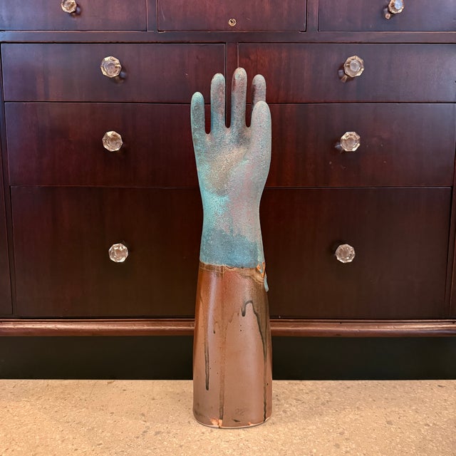This vintage industrial porcelain glove mold has been reimagined by an artist. The mold's usual white porcelain surface is...