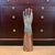 This vintage industrial porcelain glove mold has been reimagined by an artist. The mold's usual white porcelain surface is...