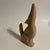 This beautiful Southwest Art Pottery figurine features a howling coyote wolf. Perfect size for display on a shelf or table.
