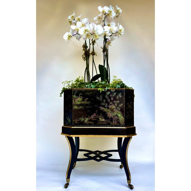 A striking Regency Chinese Export jardinière with shimmering mother-of-pearl lac burgauté inlay, raised on its original...
