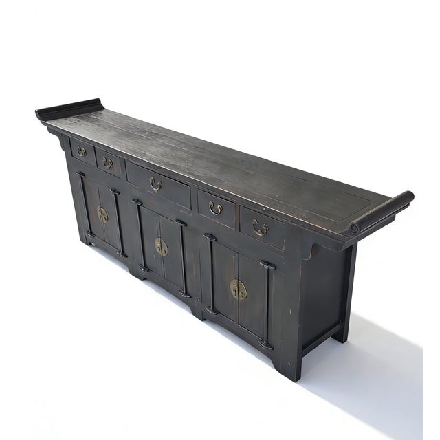 This impressive antique Chinese sideboard was handcrafted from solid elm in Shanxi, China, around 1786. Measuring an...