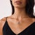 This elegant vintage tanzanite and diamond pendant necklace is a timeless design from the 2000’s, centered by a pear cut...