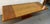 Founders dining table by Milo Baughman in two shades of walnut with aluminium trim on pedestal base, center pedestal and...