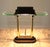 Designer lamp made of glass and polished brass on a black base. The lamp is dimmable for one smaller halogen bulb R7s up...