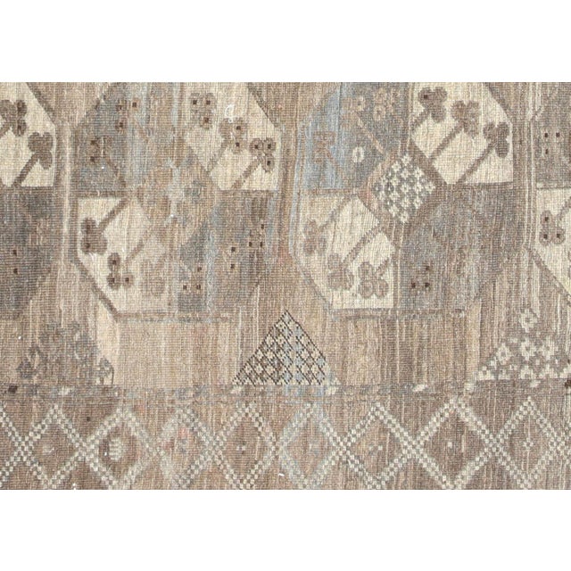 Introduce a touch of elegance to your home with this Semi Antique Afgan Beshir Rug, measuring 7'10" x 9'9". Handcrafted by...