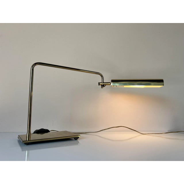 For your consideration we are presenting for sale this fantastic Vintage brass extendable arm desk lamp by Jim Bindman for...