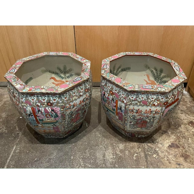 Matching Antique Chinoiserie Porcelain Planters with Koi interior. Planters are almost identical and have a lovely color...