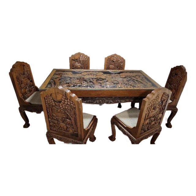 1980s Unique Teak and Acacia Carved Dining Set With 8 Different Carved Chairs For Sale