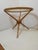 Beautiful modernist tripod (three-legged) coffee table designed by Cesare Lacca. Very elegant and with a guaranteed...