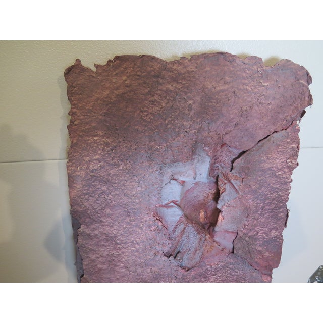 This pa-pier Ma-che' art is in the manner of the sculptor Chillida. Although the materials used are different, his being...