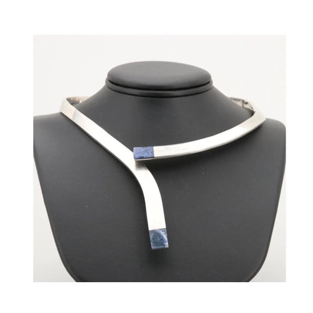 Gorgeous Modernist Mexico Sterling Silver Hinged Collar Necklace with blue sodalite end caps by a masterful designer....
