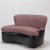 A curved sofa. Solid frame and legs. Upholstered in fine leather and fabric from Spinneyback. Designed for a private...