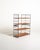 Freestanding modular and removable bookcase with black lacquered metal uprights and four adjustable teak shelves....