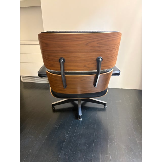 2000 - 2009 Authentic Herman Miller Eames Lounge Chair & Ottoman — Walnut Shells, Black Leather, Dated & Labeled November 2001 For Sale - Image 5 of 8