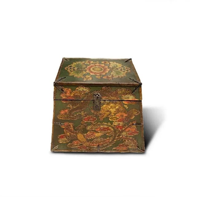 Asian Tibetan hand carving trunk is made out of elm wood. It is all handmade with hand carving. You can feel the texture...