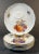 Beautiful, antique set of six appetizer plates, gold rimmed with fruit motif, made in Germany. Each plate depicts a...