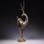 This striking antique bronze sculpture depicts a standing deer, a traditional symbol of longevity, wealth, and good...