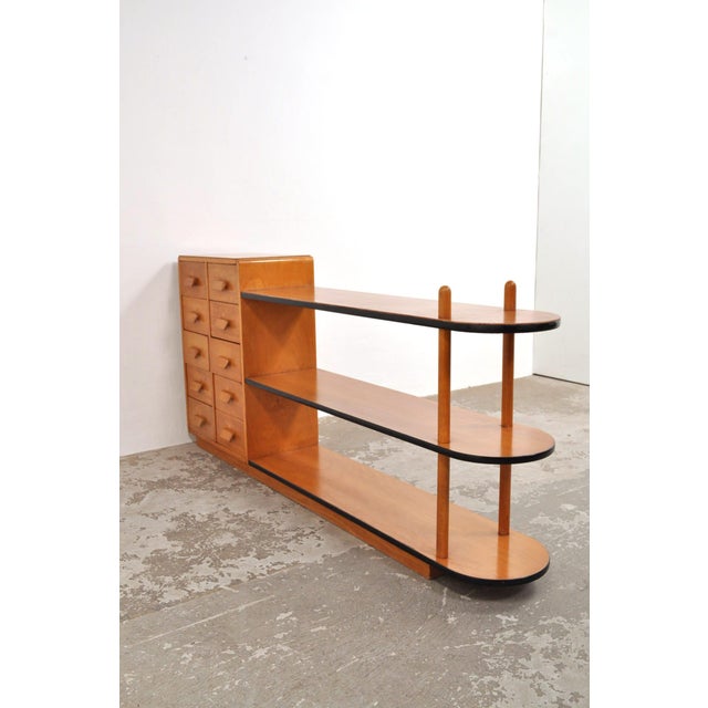 A unique piece of furniture, this beechwood sideboard or tv stand can also be used as a room divider and features a drawer...