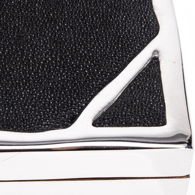 The "Melting Box" by R&Y Augousti is a masterful creation, combining luxurious materials and elegant design into a...