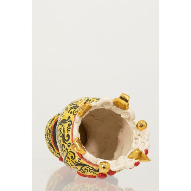 This striking pair of handcrafted ceramic Moor head vases by Caltagirone showcases the rich artistic tradition of Sicilian...