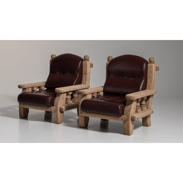 A brown wood, Brutalist-style armchair, dating to the 1970s and made in Netherlands. The wood frame is finished in...
